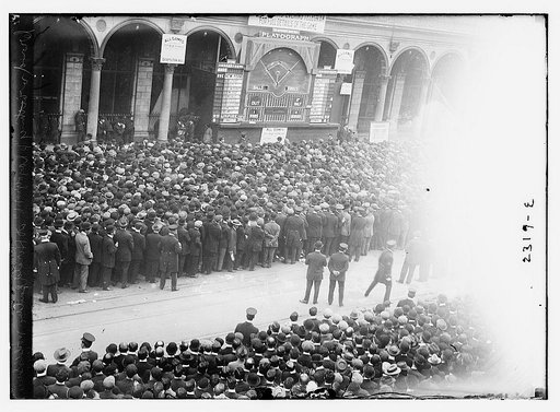Crowd watching "playograph" at Herald Building, World Series, 1911