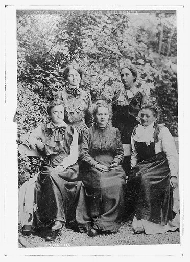 Mme. Curie and four students