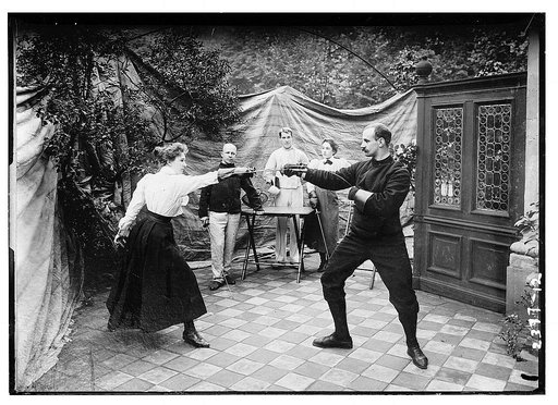 man and woman fencing (?)