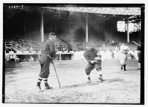 John McGraw (left) & Chief Meyers (catching), New York NL (baseball) at the 1911 World Series)