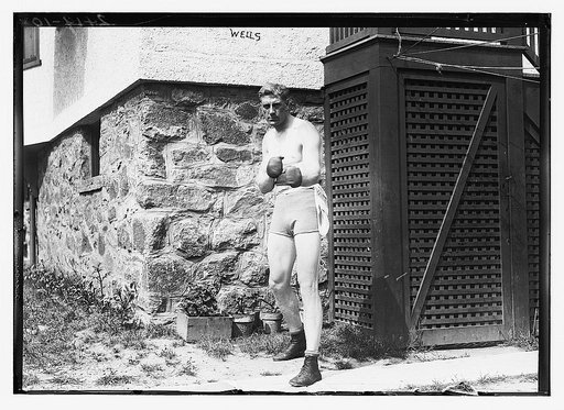 Bombardier Billy Wells, English boxer, preparing in Rye, N.Y., for fight with Al Panzer