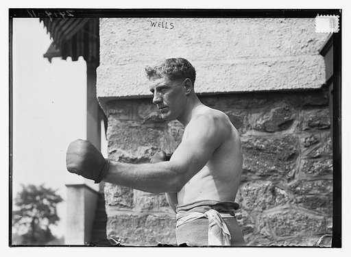 Bombardier Billy Wells, English boxer, preparing in Rye, N.Y., for fight with Al Panzer