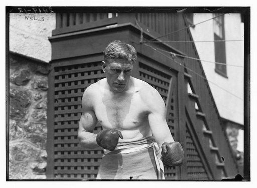 Bombardier Billy Wells, English boxer, preparing in Rye, N.Y., for fight with Al Panzer