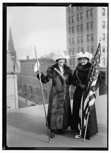 Suffragettes with flag