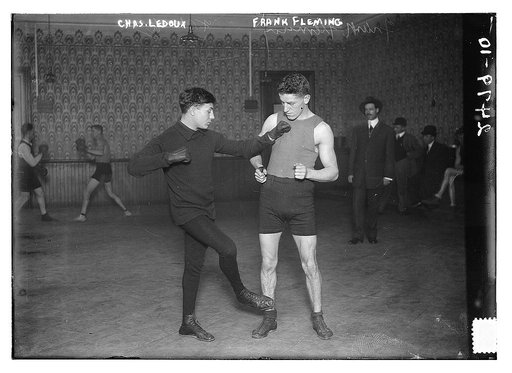 French boxer Charles "Little Apache" Ledoux and Frank Fleming