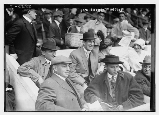 Boxer Jim Corbett (center) and Blossom Seeley (wife of Rube Marquard) to Corbett's left at Game One of the 1913 World Series at the Polo Grounds New York (baseball)