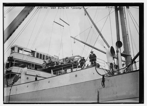 Loading war auto. on SUGURA [i.e., Loading a truck chassis on the Suruga