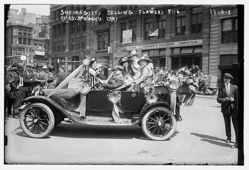 Suffragists selling flowers, 5/16 (Mrs. Spinack's car)