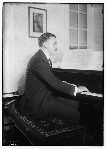 James [at piano