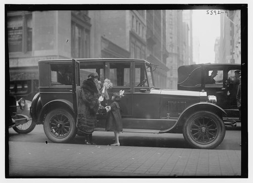 Italian coloratura soprano opera singer Amelita Galli-Curci (1882-1963), standing next to an automobile