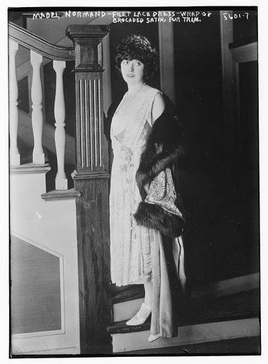 Mabel Normand - filet lace dress - wrap of brocaded satin fur trim