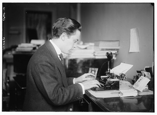 Bonelli [at typewriter