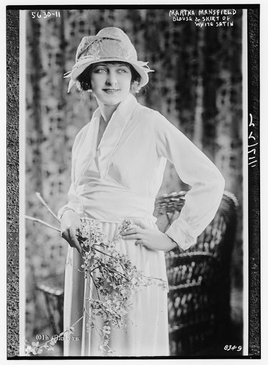 Martha Mansfield -  Blouse and skirt of white satin