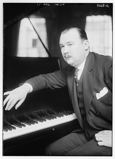 Unidentified man at piano