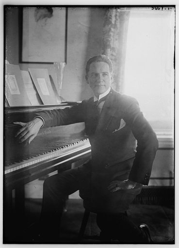 Johnson [seated near piano