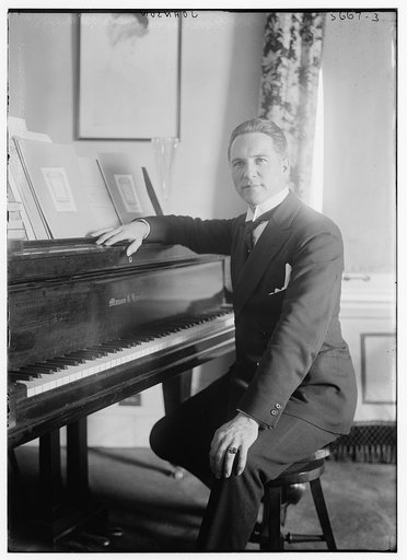 Johnson [seated near piano