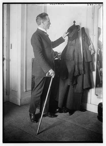 Johnson [with hat & cane