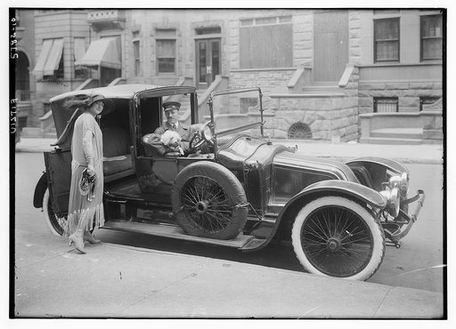 Fitziu [about to enter chauffer driven car