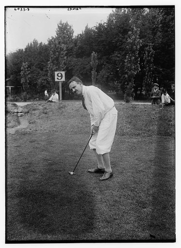 James [playing golf