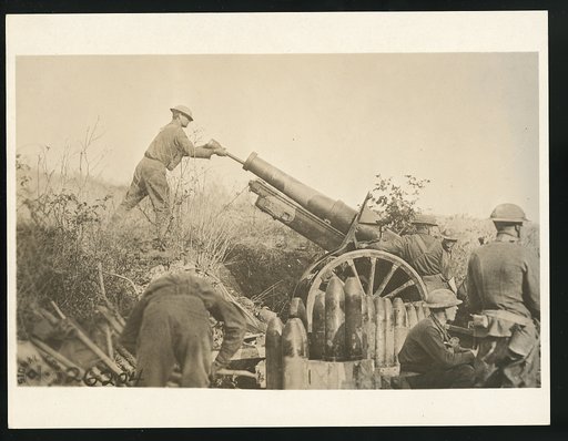 American 155 mm artillery cooperating with the 29th Div. in position on road just taken from the Germans. Bat[tery] A 324th artillery, 158[th] Brig[ade] in France