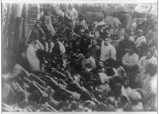 China, Changsha; mass of people at waterfront, near view of crowd