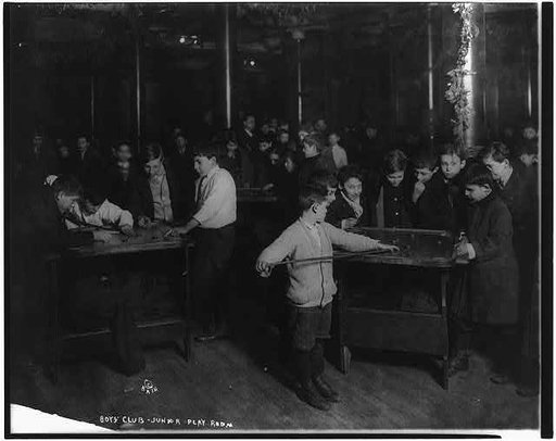 New York City - scenes in Boys Club recreation center: playing caroms in junior play room