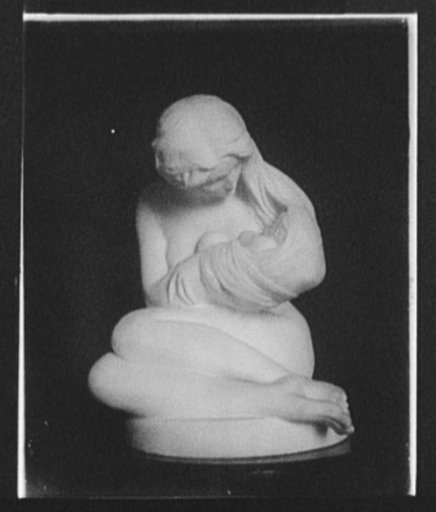 Sculpture of seated woman, with hair entwined around child