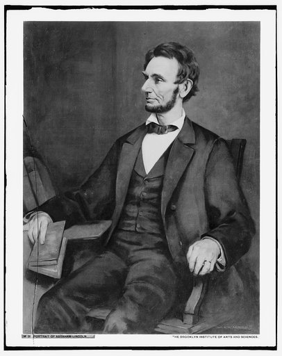Abraham Lincoln, seated in chair, full portrait
