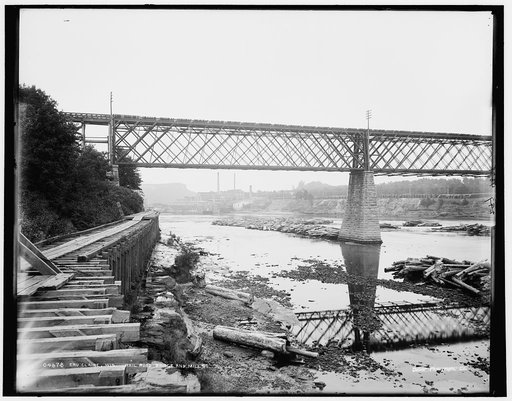 Eau Claire, Wis., railroad bridge and mills