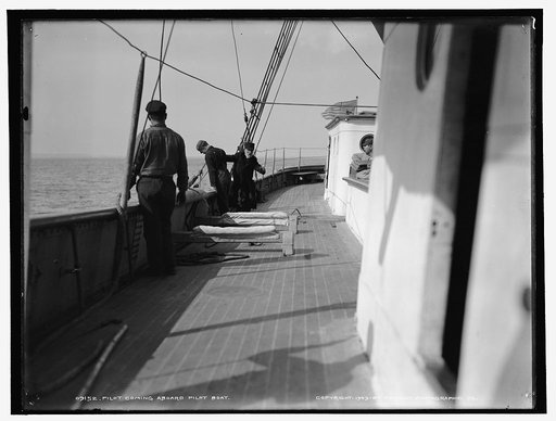 Pilot coming aboard pilot boat