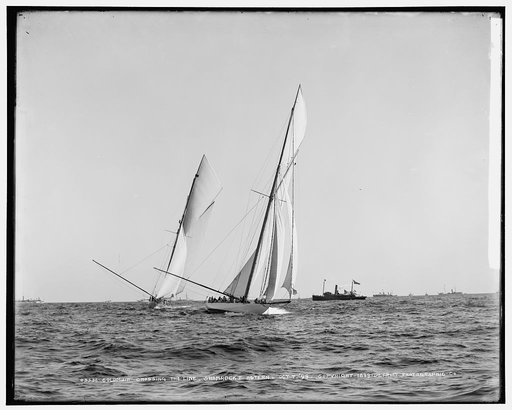 Columbia crossing the line, Shamrock I astern