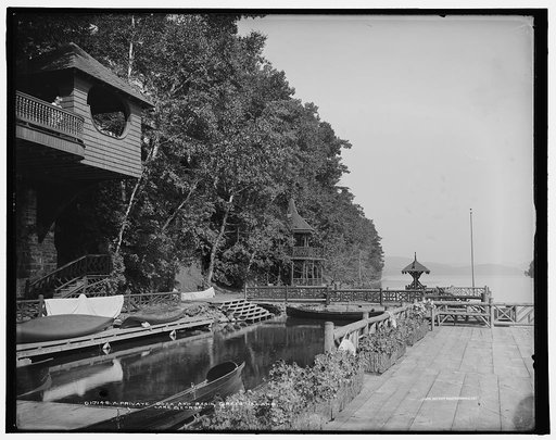 A Private dock and basin, Green Island, Lake George, N.Y.