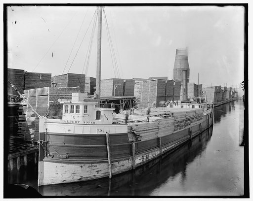 Loading lumber on steamer at lumberyards, Menominee, Mich.