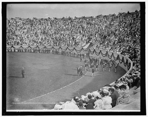 Alumni and band entering stadium, Harvard University class day exercises