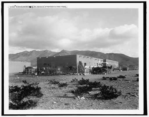 Mexican adobe house, Mt. Franklin in distance, El Paso, Texas