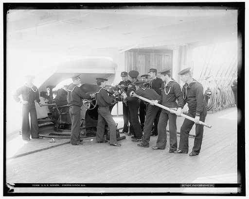 U.S.S. Newark, loading 6-inch gun
