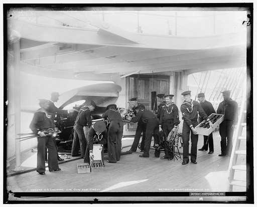 U.S.S. Newark, 6 in. gun and crew