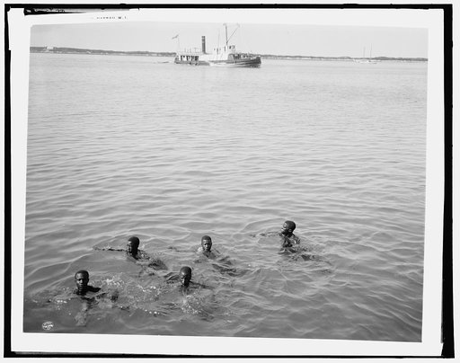 Diving for coins, Nassau, W.I.