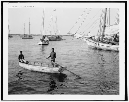 Diving for coins, Nassau, W.I.