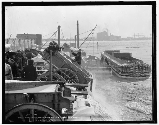 Dumping snow into the river after a blizzard, New York