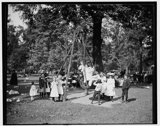 Children swinging in a playground or park