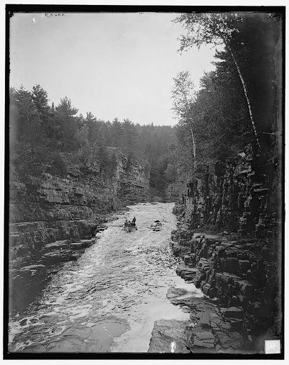 Running the rapids, high water, Ausable Chasm, N.Y.