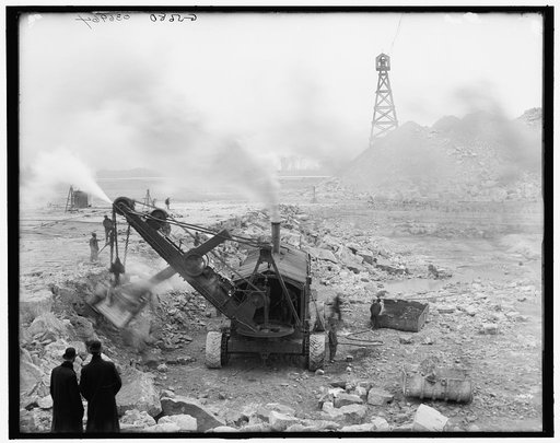 Steam shovel removing rock loosened by dynamite, Livingstone Channel, Mich.