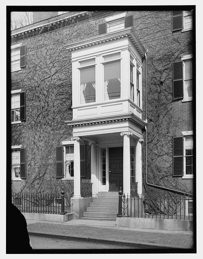 Three-story house with second-story bay window over porch, probably Salem, Mass.
