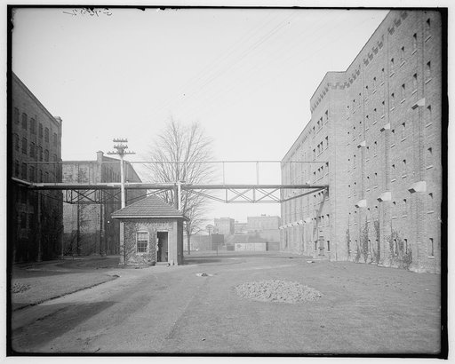 Avenue of rack warehouses, Hiram Walker & Sons, Walkerville, Ont.