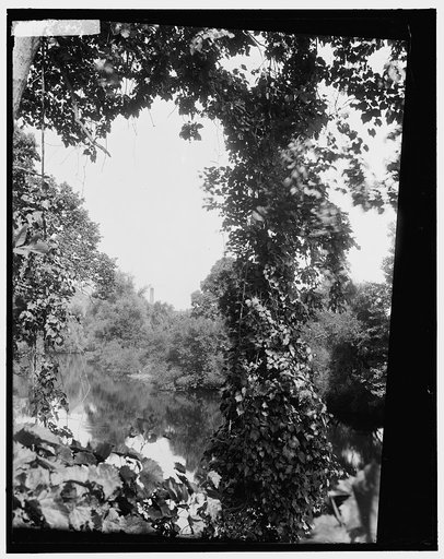 Riverscape with smokestack, probably the Huron River, Ypsilanti, Mich.