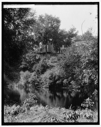 House above river, probably the Huron River, Ypsilanti, Mich.