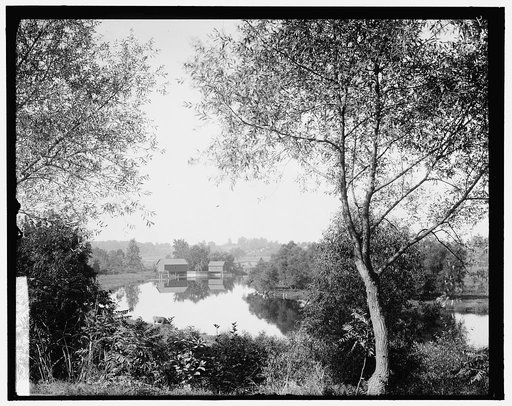 Buildings by river, probably the Huron River, Ypsilanti, Michigan