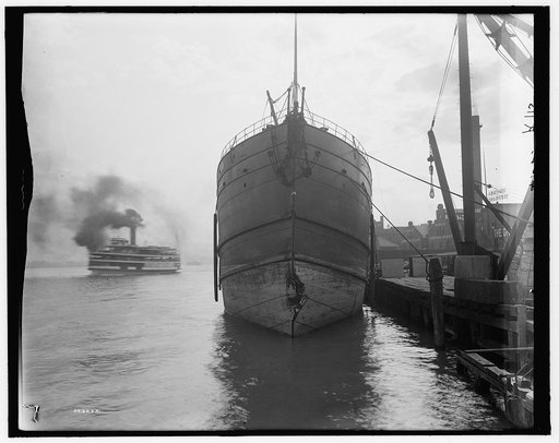 Unidentified freighter, Detroit, Michigan, with passenger steamer Britannia in the distance