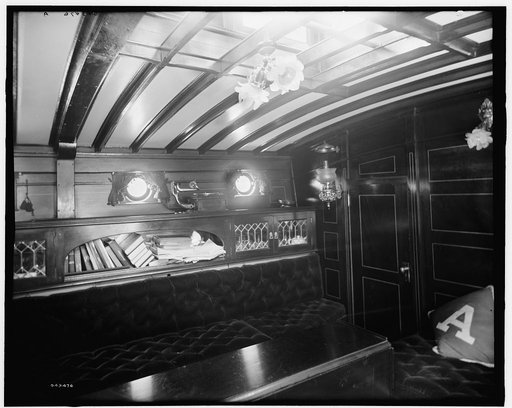 Yacht Althea, cabin, showing books